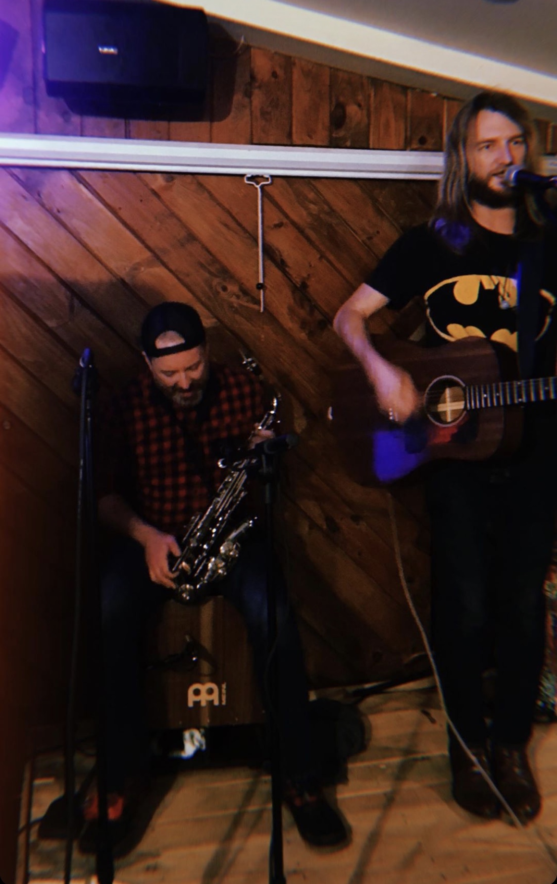 Robbie and Kristofer trading a song at the pub