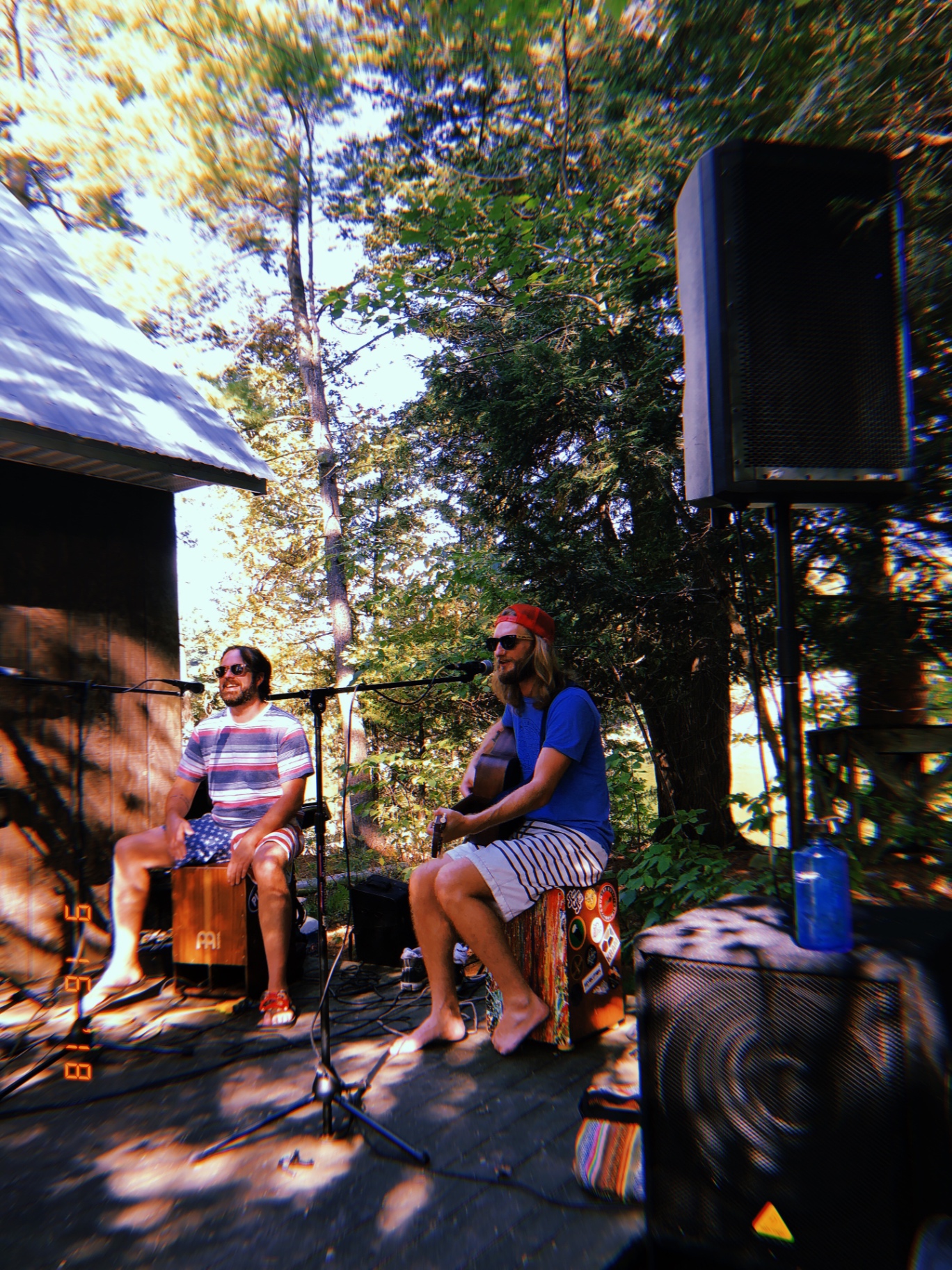 Robbie on cajón and Kristofer on guitar, outdoor set